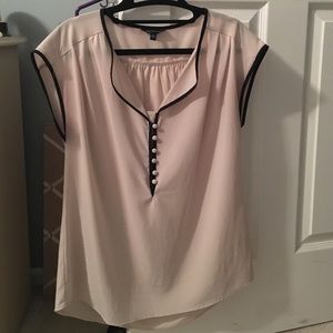 Tan blouse with black outline