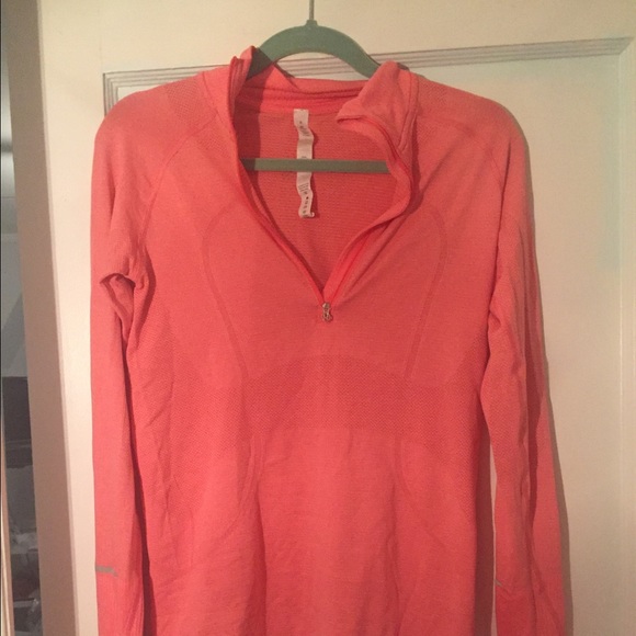 Salmon pink LuLuLemon quarter zip sweatshirt