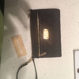 Michael Kors elegant LG wristlet black brand new
