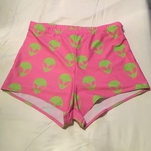 Neon pink and green high waisted alien head shorts