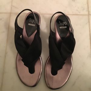 Adorable slip on sandal. Inpo Stretch.