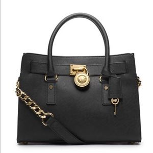 Like new Michael kors Hamilton satchel with gold
