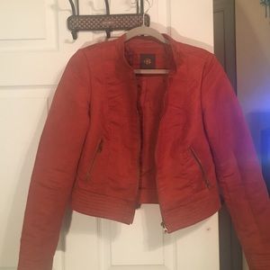 A cute vintage burnt orange jacket.