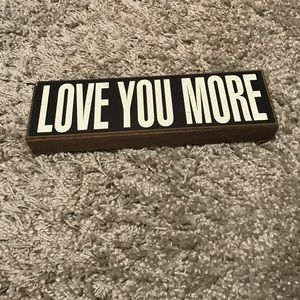 Love you more wood sign