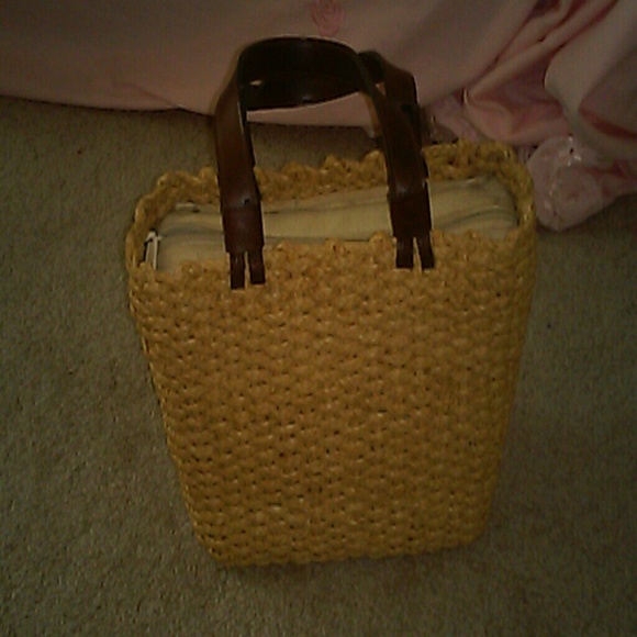 Express Basket Tote for woman. Tan.Used .8.5W.7.5L