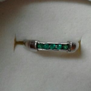 Authentic silver and emerald ring.