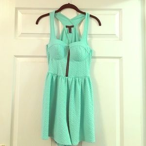 Mint colored romper.