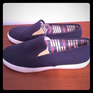Sperry Top-Sider Navy and gold slip on shoes.