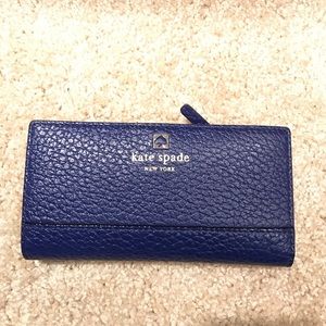 Kate Spade navy pebbled wallet.