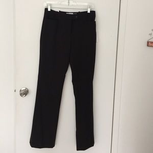 Calvin Klein black dress pants with tags.