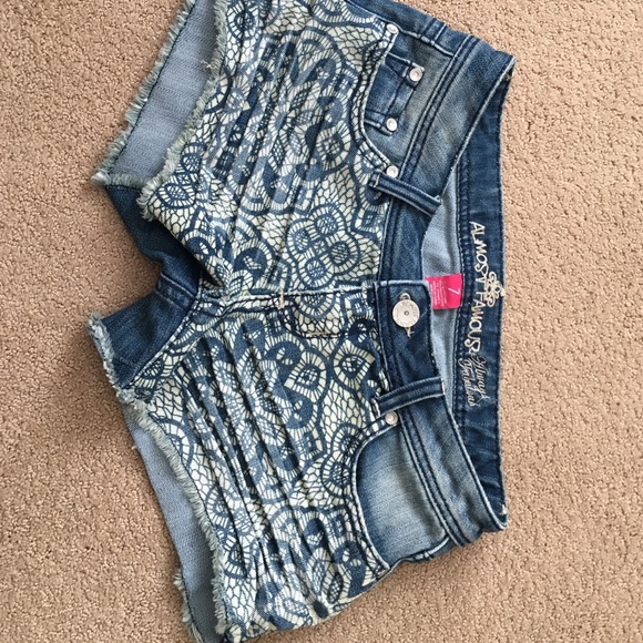 Jean shorts with lace detail in front