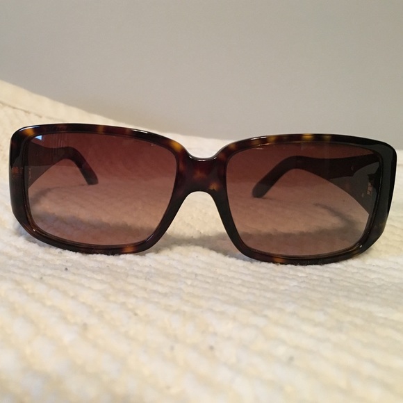 Prada. Tortoise-shell sunglasses.