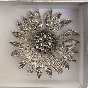 Silver flower brooch