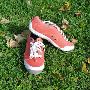 Orange-pink tennis shoes