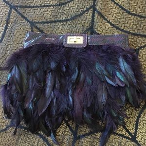 Purple python print feather clutch