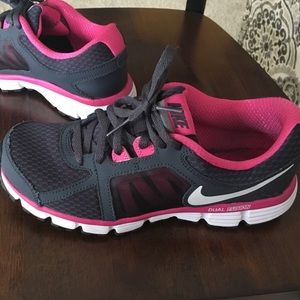 Nike grey and pink Dual Fusion ST2