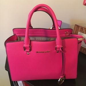 Beautiful hot pink Michael Kors handbag.