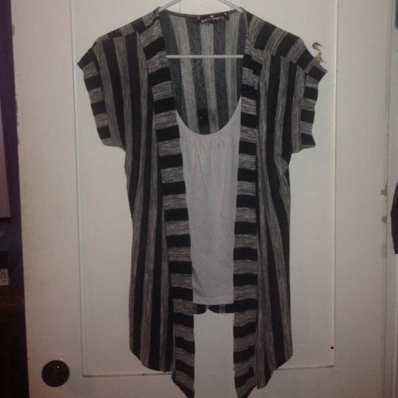 A very nice cardigan with a white shirt attached