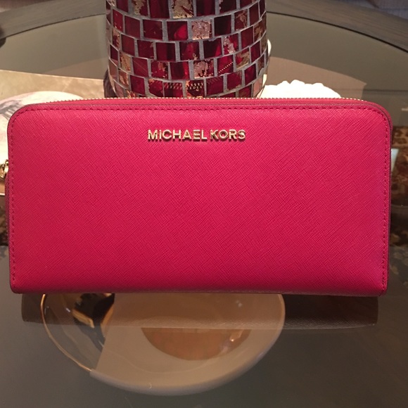 Michael Kors Handbags - Michael Kors Cherry wallet. Jet Set zip around