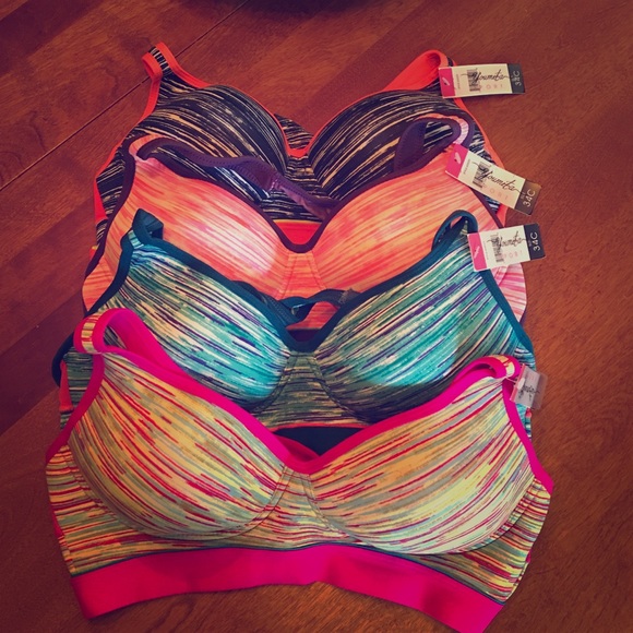4 sport bras- new with tags. Never worn.