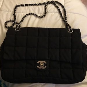 Chanel canvas quilted black and gold purse