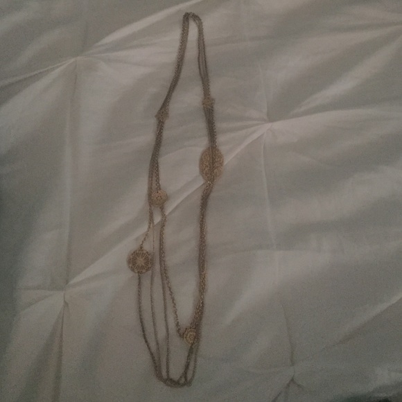 Long gold necklace