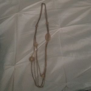 Long gold necklace