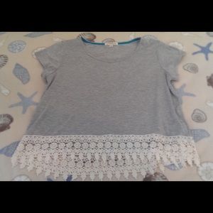 Gray top with white lace at the bottom