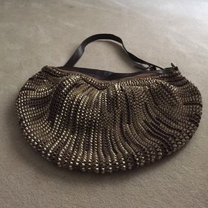 Diane Von Furstenberg leather woven messenger bag.