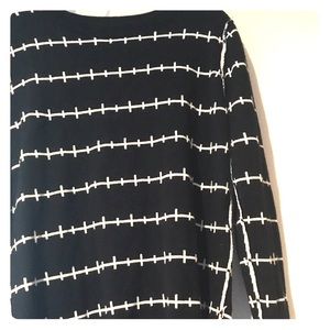 Reversible 100% Acrylic sweater. Hand wash only