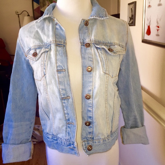 Light wash distressed denim jacket