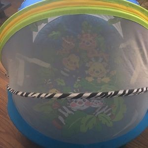 Baby clothes and little play pin
