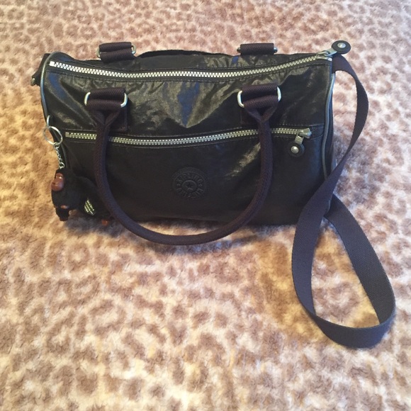 2016 Black leather Kipling messenger bag.