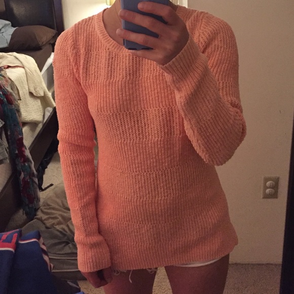Small peach colored L.L. Bean knot sweater