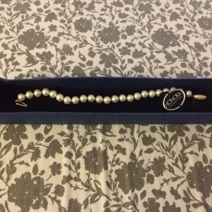 Honora cultured pearls w/ 14 kt gold clasp.