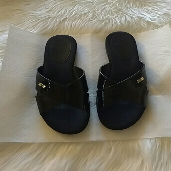 Black Cole Haan patent leather flat slides