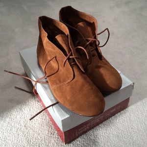 Breckelle's tan lace up booties