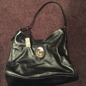 Black leather authentic coach bag . Hardly used