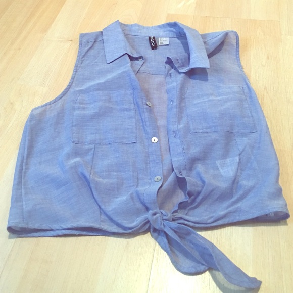 A sheer denim sleeveless crop top