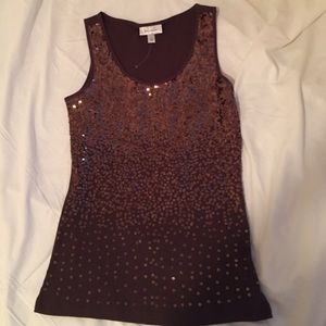 Sleeveless brown beaded top.