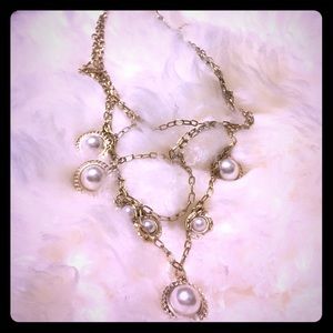 Pearl and gold 4 strand statement coin necklace
