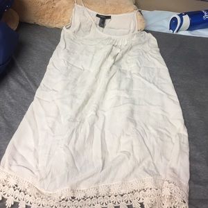 Mini flowy dress with bottom lace detail