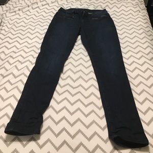 MK dark, skinny jeans.