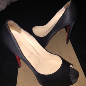 Satin Christian Louboutins.