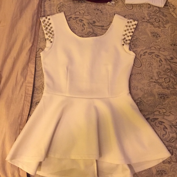 White peplum Bebe top with studs