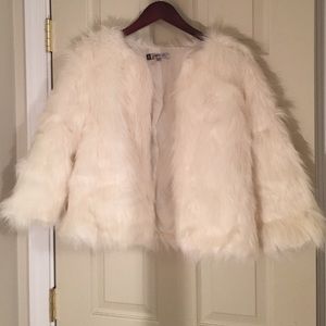 Jennifer Lopez white fur jacket