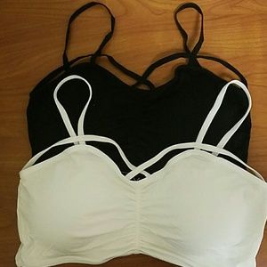 Criss cross designed sports bras NEVER WORN