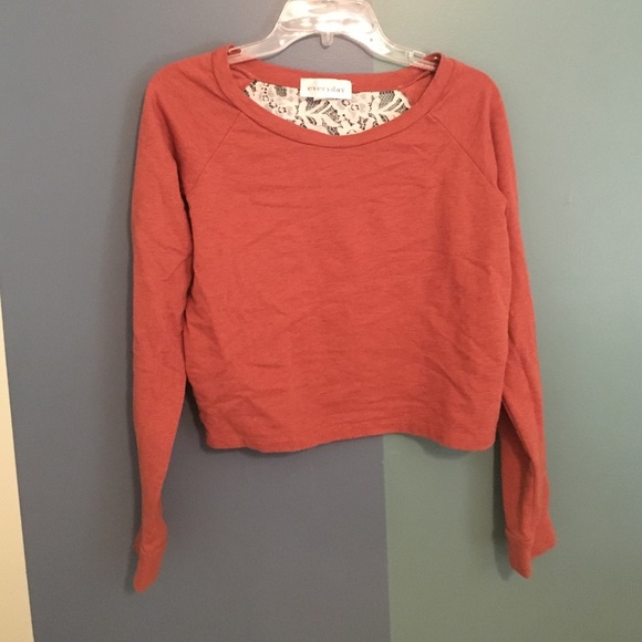 Slightly worn burnt orange with lace back shirt