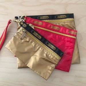 LeSportsac 3 pack pouches. Never used