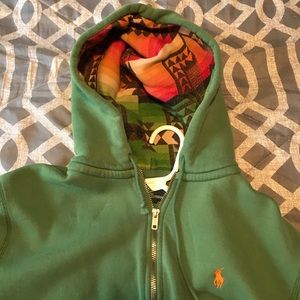 Green Polo hoodie with tribal pattern